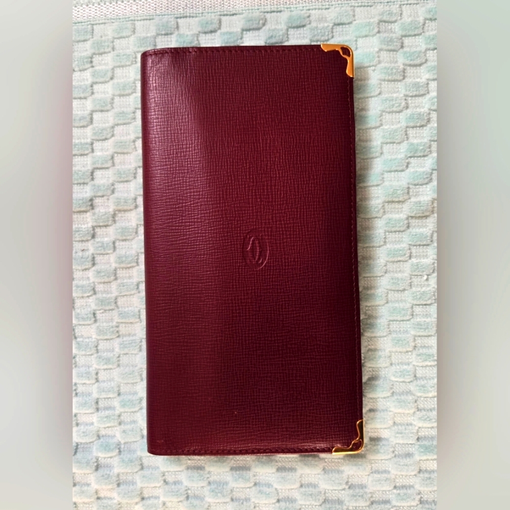 Cartier Burgundy Leather Wallet with Gold Accents